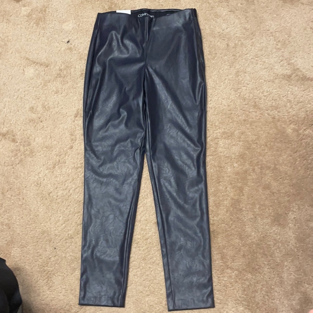 Calvin Klein faux leather side zip pant.